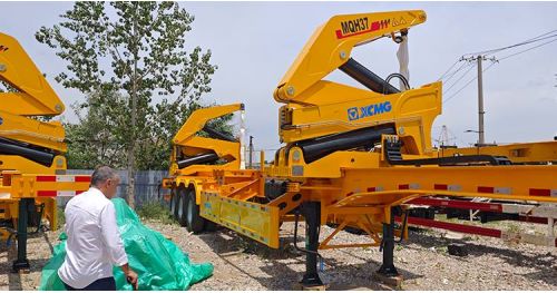 The Comoros Customer Representative Came to Titan to Inspect the Side Loader and Place a New Order