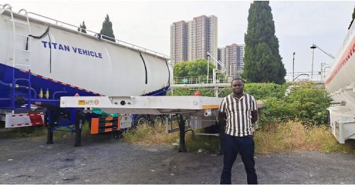 Ghana Customer Visited Titan and Purchased Flatbed Trailer