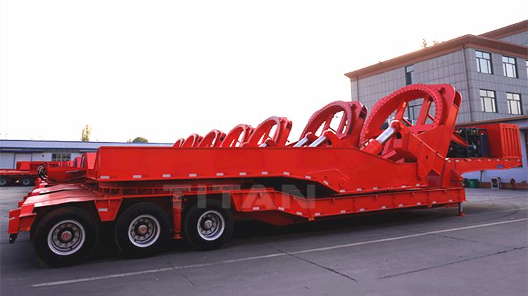 The wind blade trailer adopts the pulling structure to extend the length, and the wind blade lies flat on top of the trailer. The significant feature of the wind blade transport semi-trailer is that it is super long and has longitudinal expansion and contraction. Due to the super length of the vehicle type, the turning difficulty is significantly increased. To overcome driving on the curve, the wind blade transport vehicle is generally equipped with a hydraulic steering system, and the rear axle is fitted with a power station.