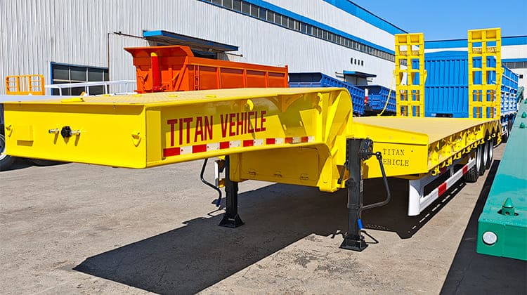 Tri Axle Tractor Semi Low Loader Truck Trailer for Sale in Tanzania